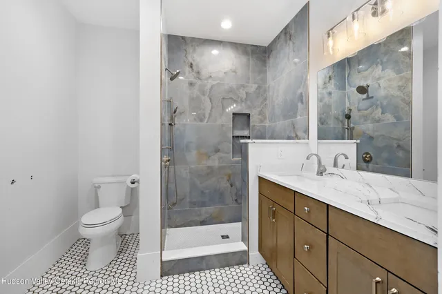 a view of a hallway with washer and dryer