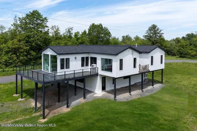 a view of a back yard of the house