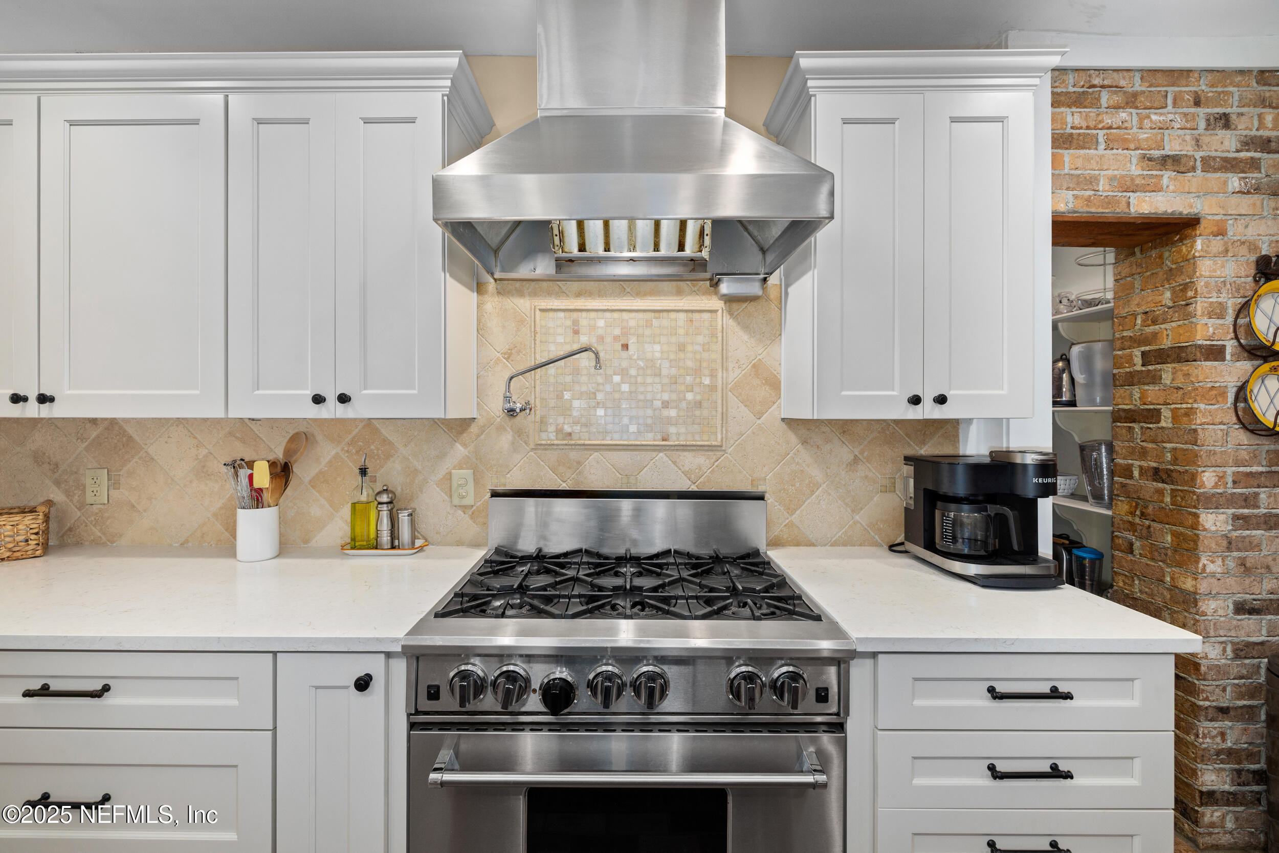 12367 Mandarin Road Jacksonville, FL 32223 - Photo 11 of 114 a stove top oven sitting inside of a kitchen