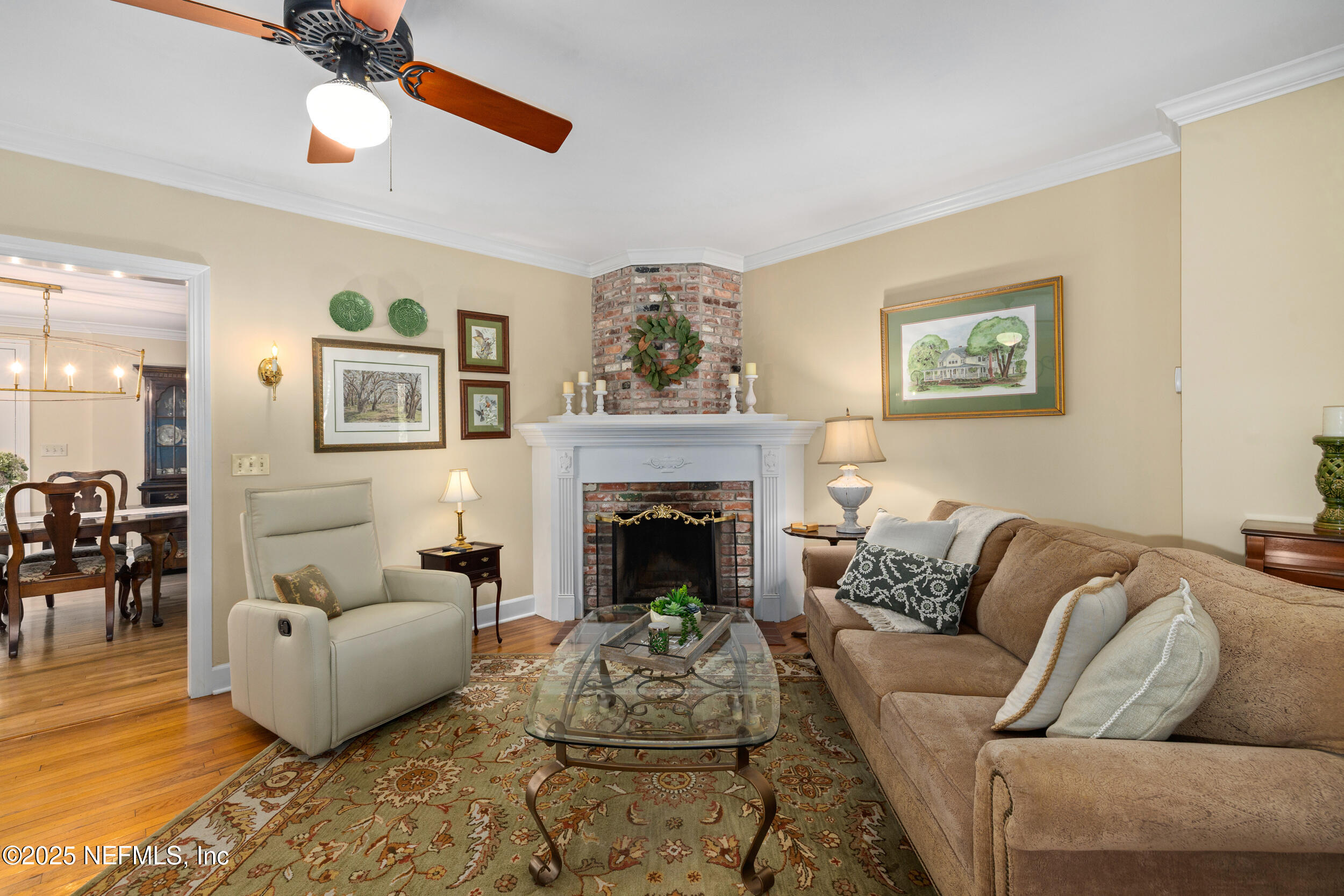 12367 Mandarin Road Jacksonville, FL 32223 - Photo 14 of 114 a living room with furniture and a fireplace