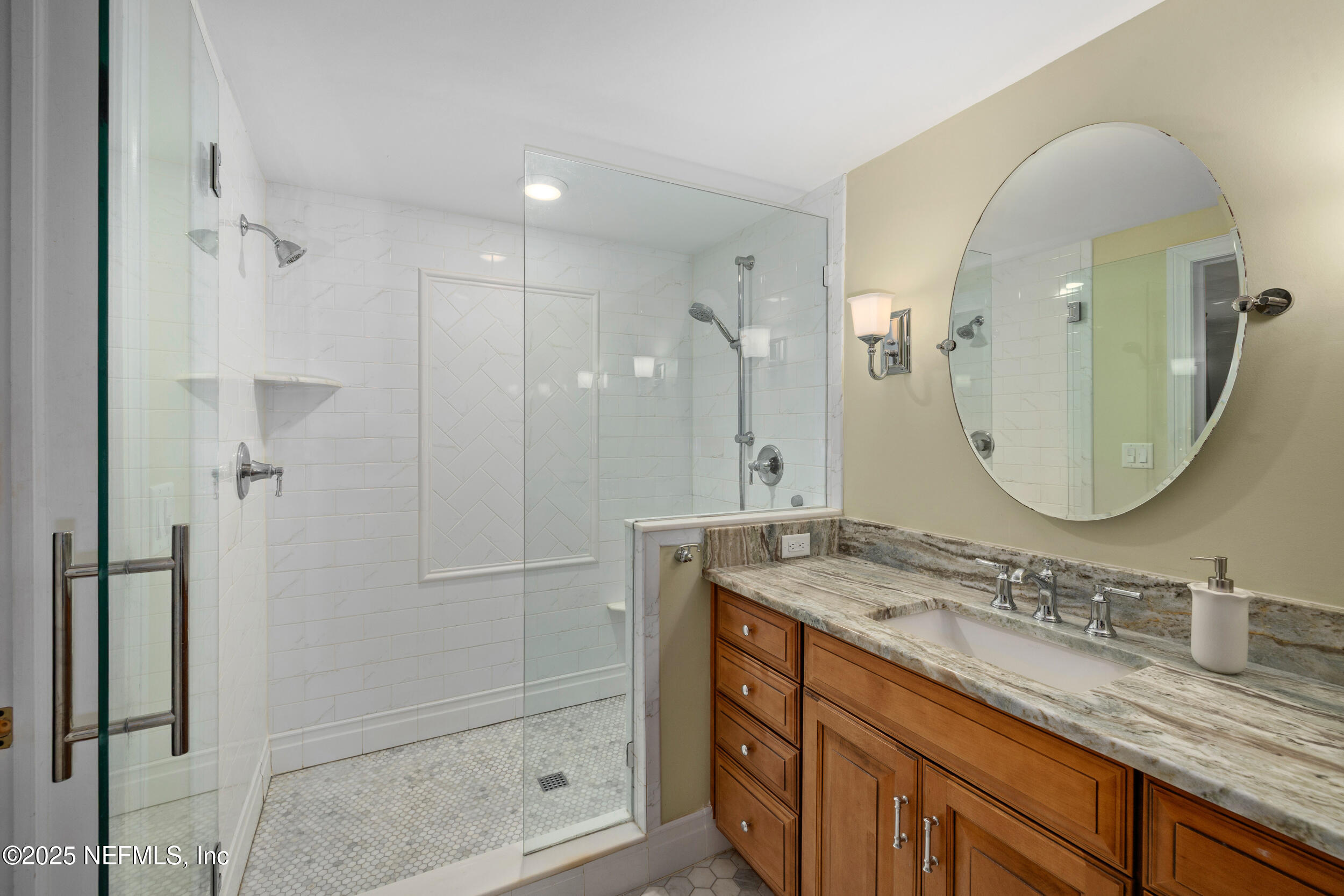12367 Mandarin Road Jacksonville, FL 32223 - Photo 22 of 114 a bathroom with a granite countertop sink mirror and shower