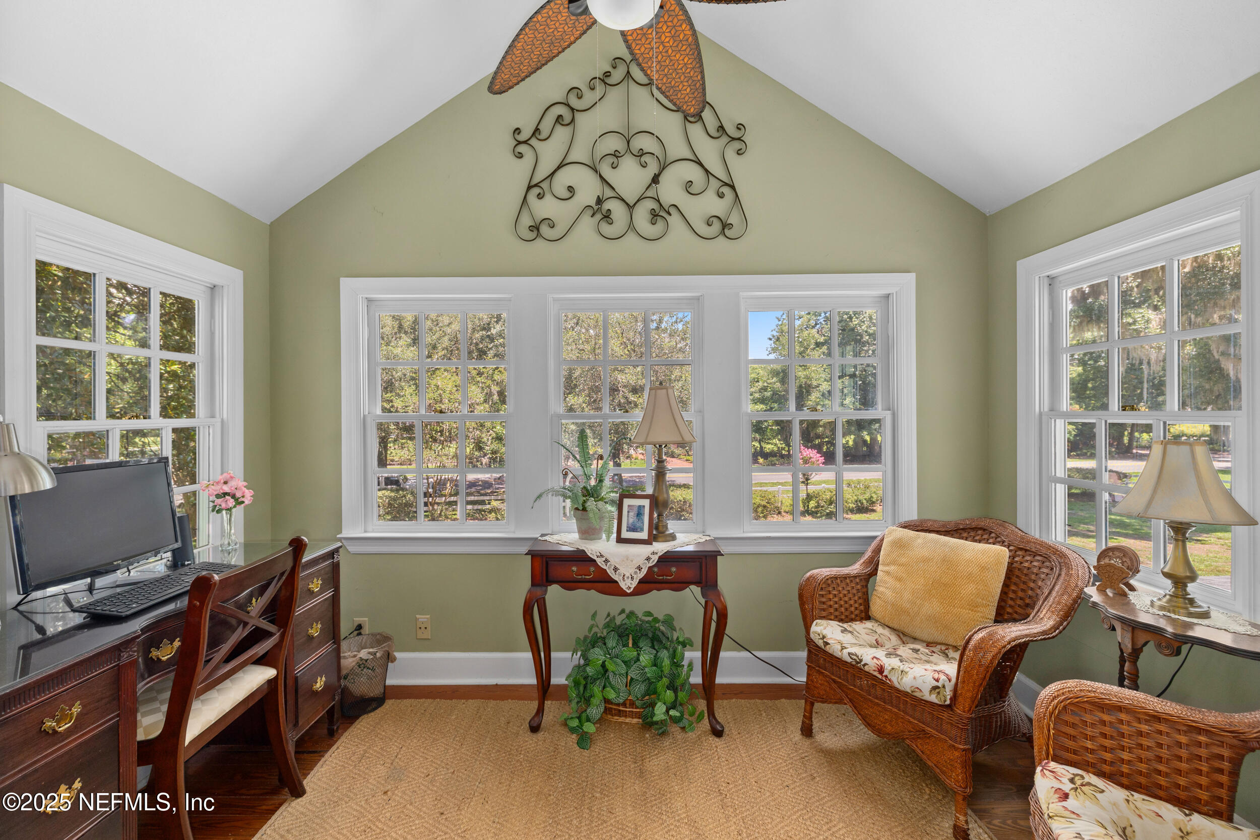 12367 Mandarin Road Jacksonville, FL 32223 - Photo 23 of 114 a living room with furniture and a flat screen tv