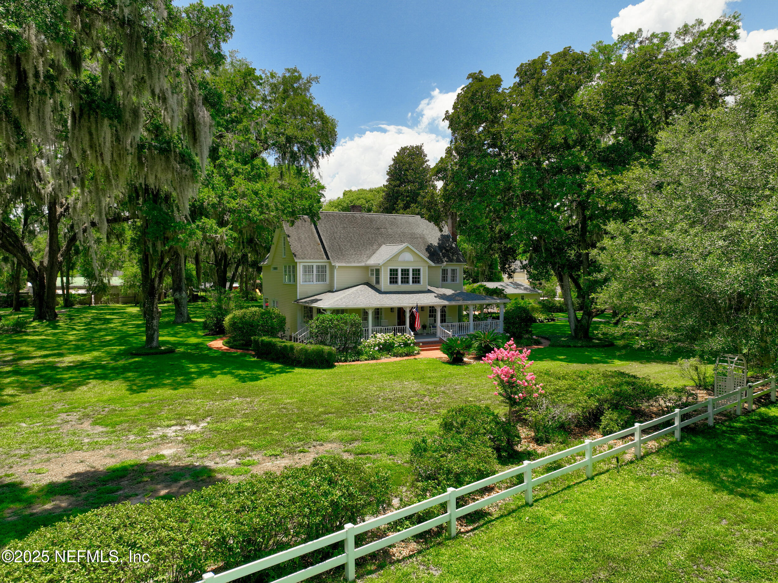 12367 Mandarin Road Jacksonville, FL 32223 - Photo 3 of 114 a view of a garden with an houses