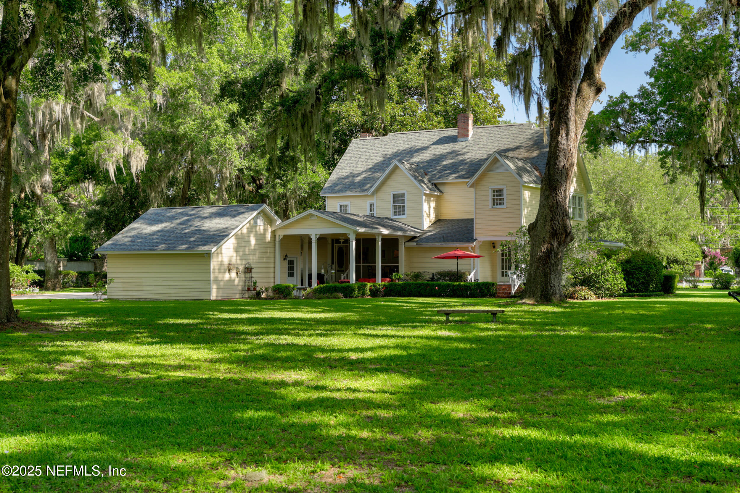 12367 Mandarin Road Jacksonville, FL 32223 - Photo 58 of 114 a front view of a house with a garden