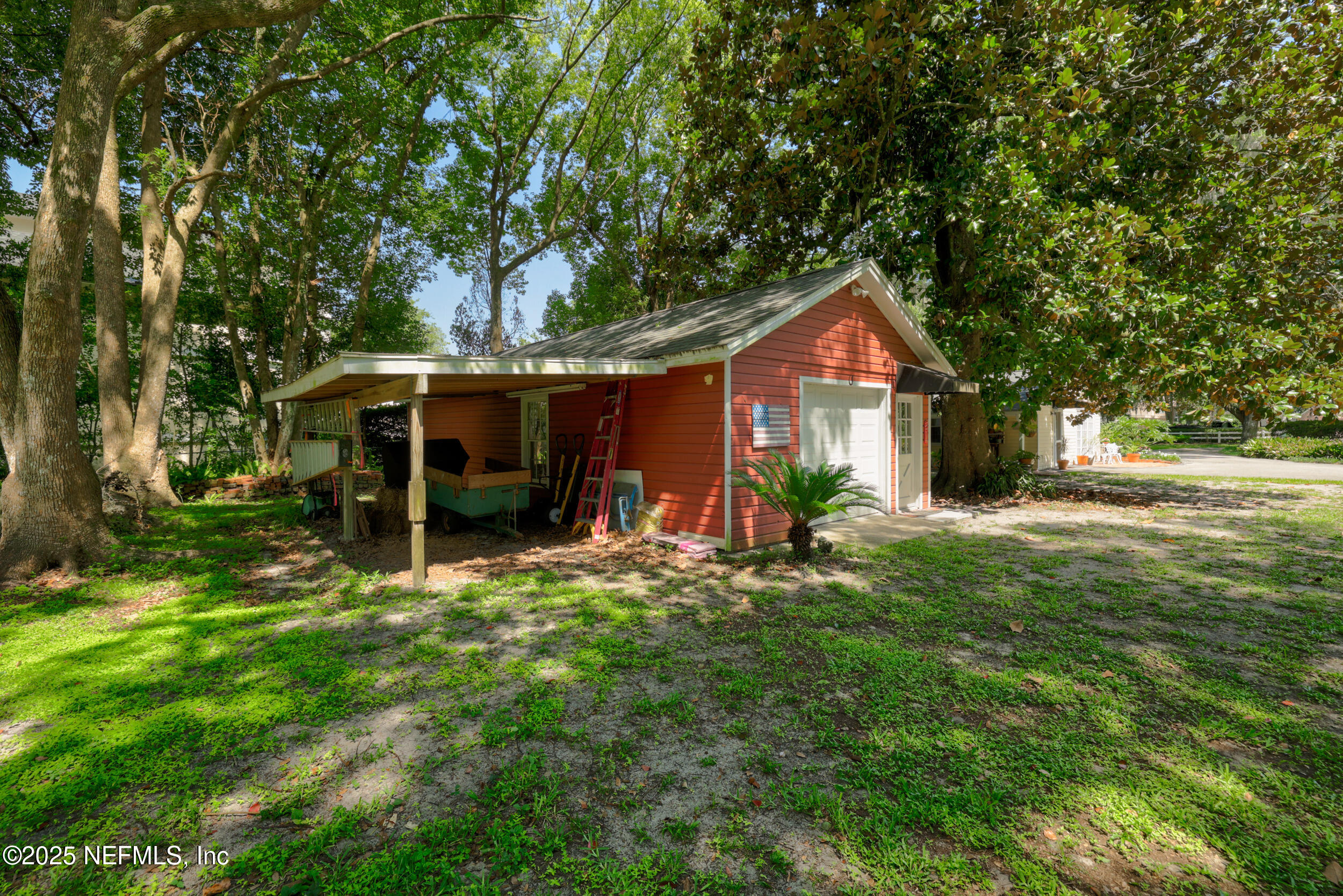 12367 Mandarin Road Jacksonville, FL 32223 - Photo 60 of 114 a front view of a house with a yard