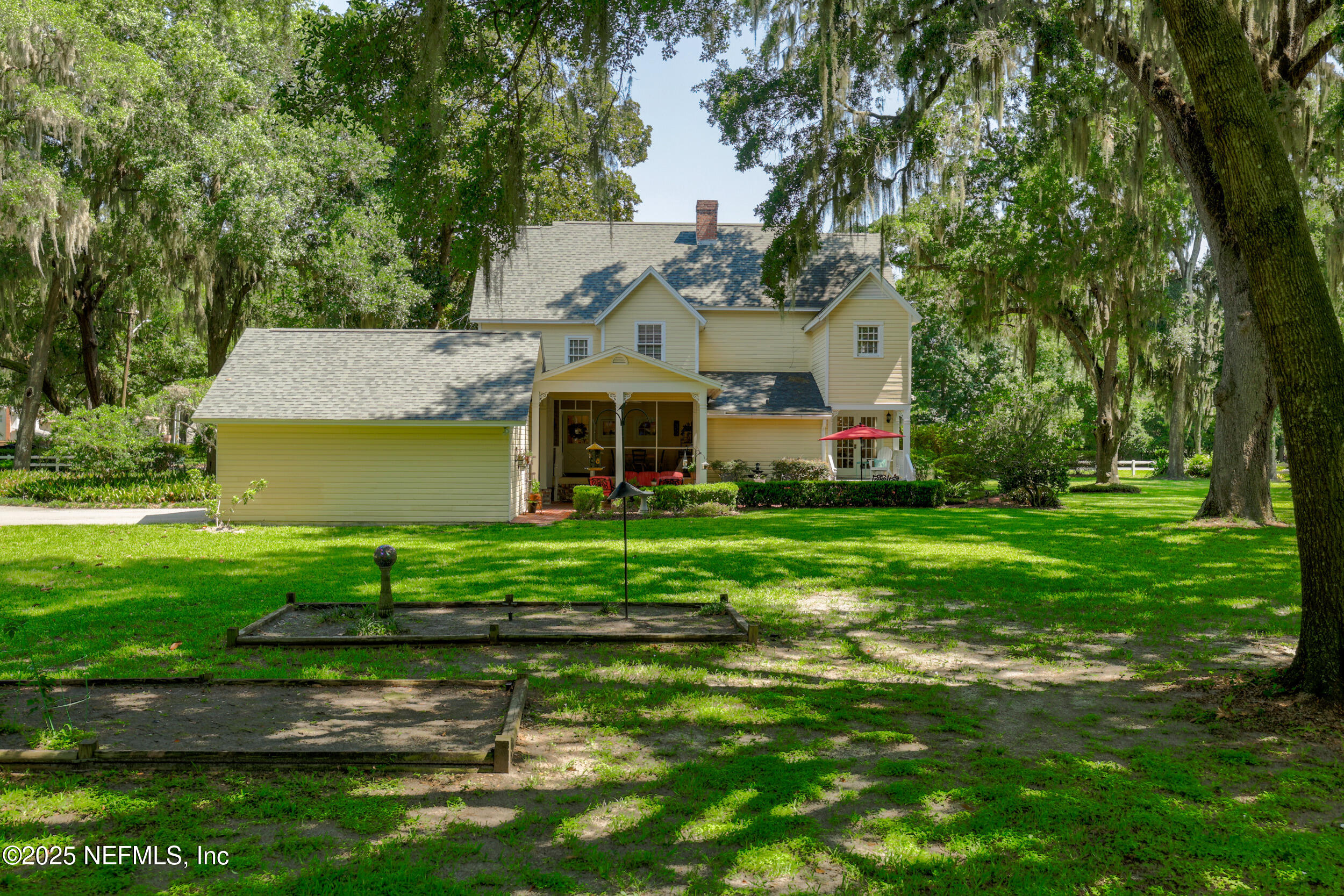 12367 Mandarin Road Jacksonville, FL 32223 - Photo 61 of 114 a front view of a house with a yard