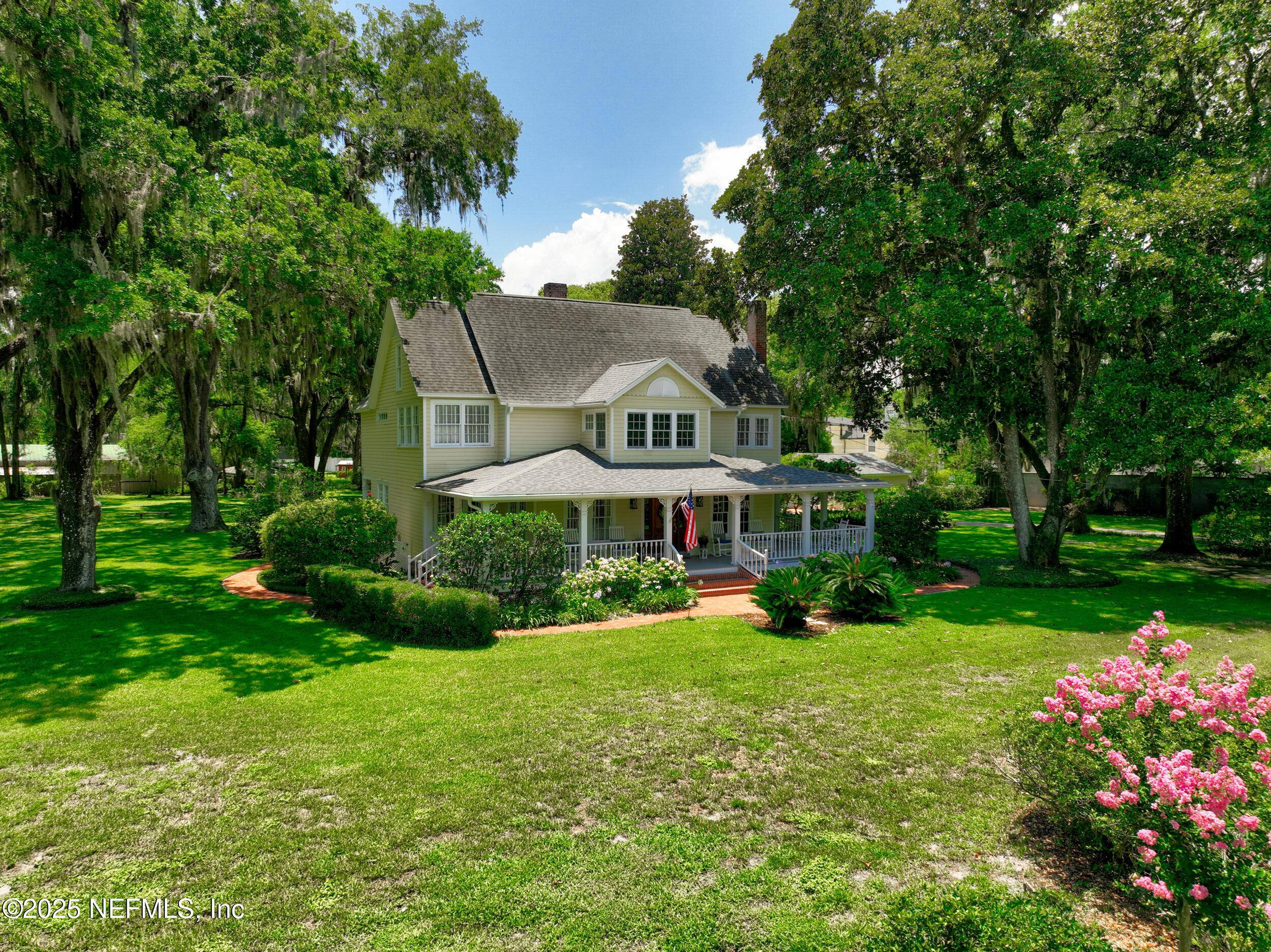 12367 Mandarin Road Jacksonville, FL 32223 - Photo 70 of 114 a view of a house with garden and trees
