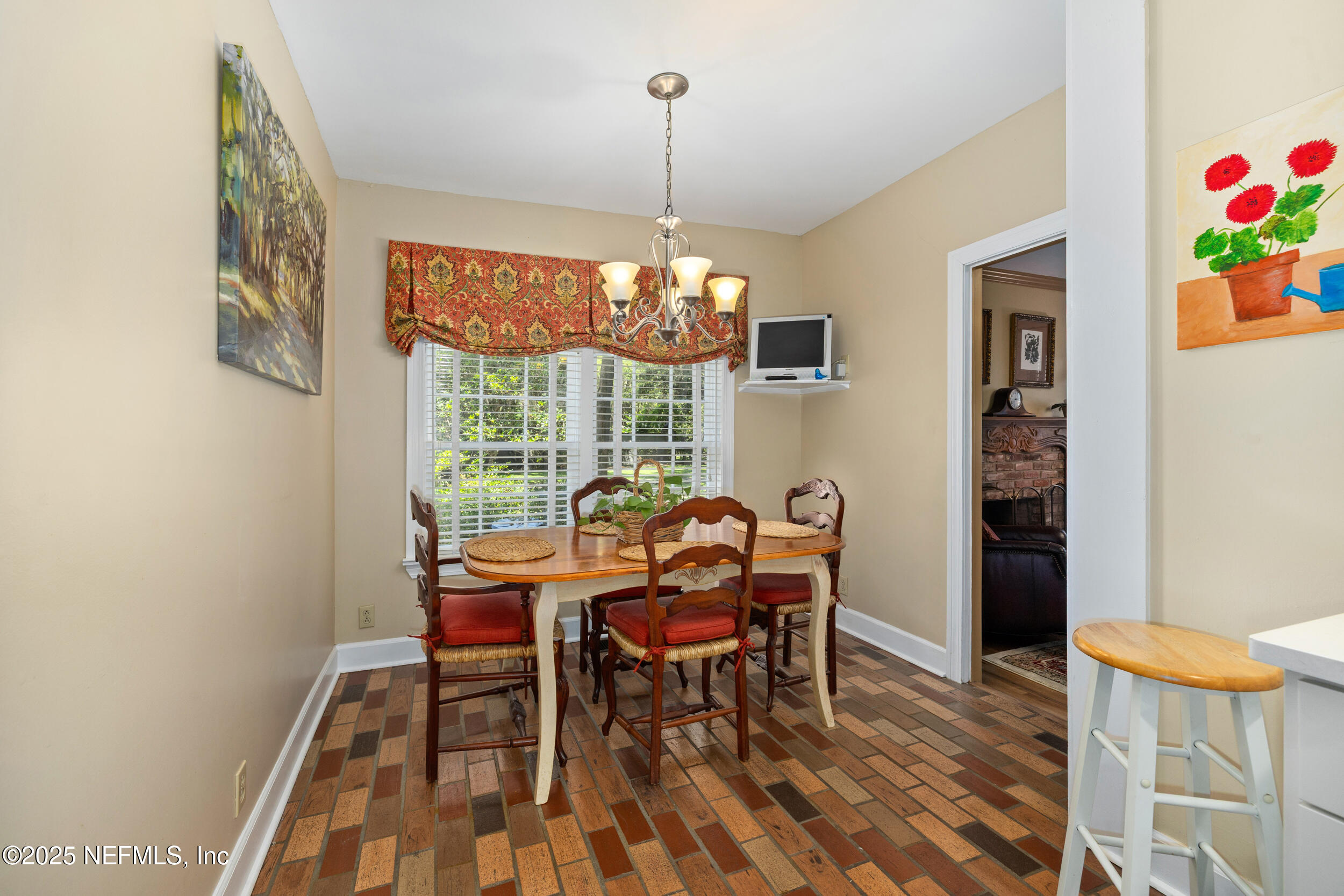 12367 Mandarin Road Jacksonville, FL 32223 - Photo 81 of 114 a dining room with furniture and window