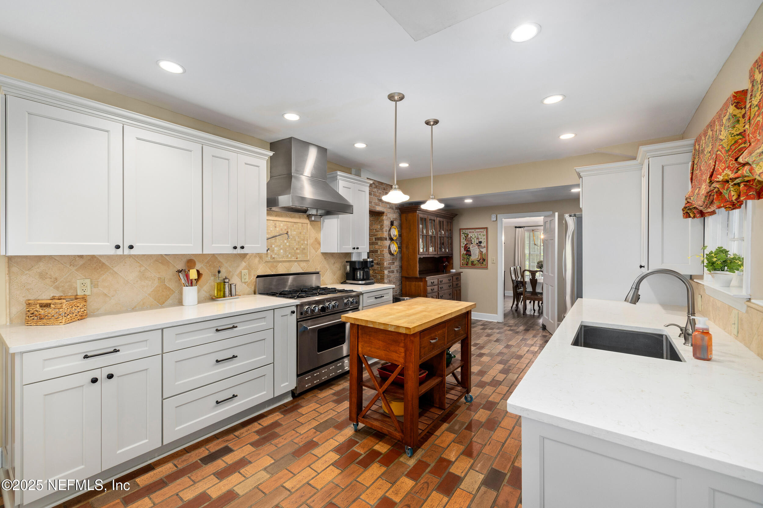 12367 Mandarin Road Jacksonville, FL 32223 - Photo 84 of 114 a kitchen with stainless steel appliances kitchen island granite countertop a sink and cabinets