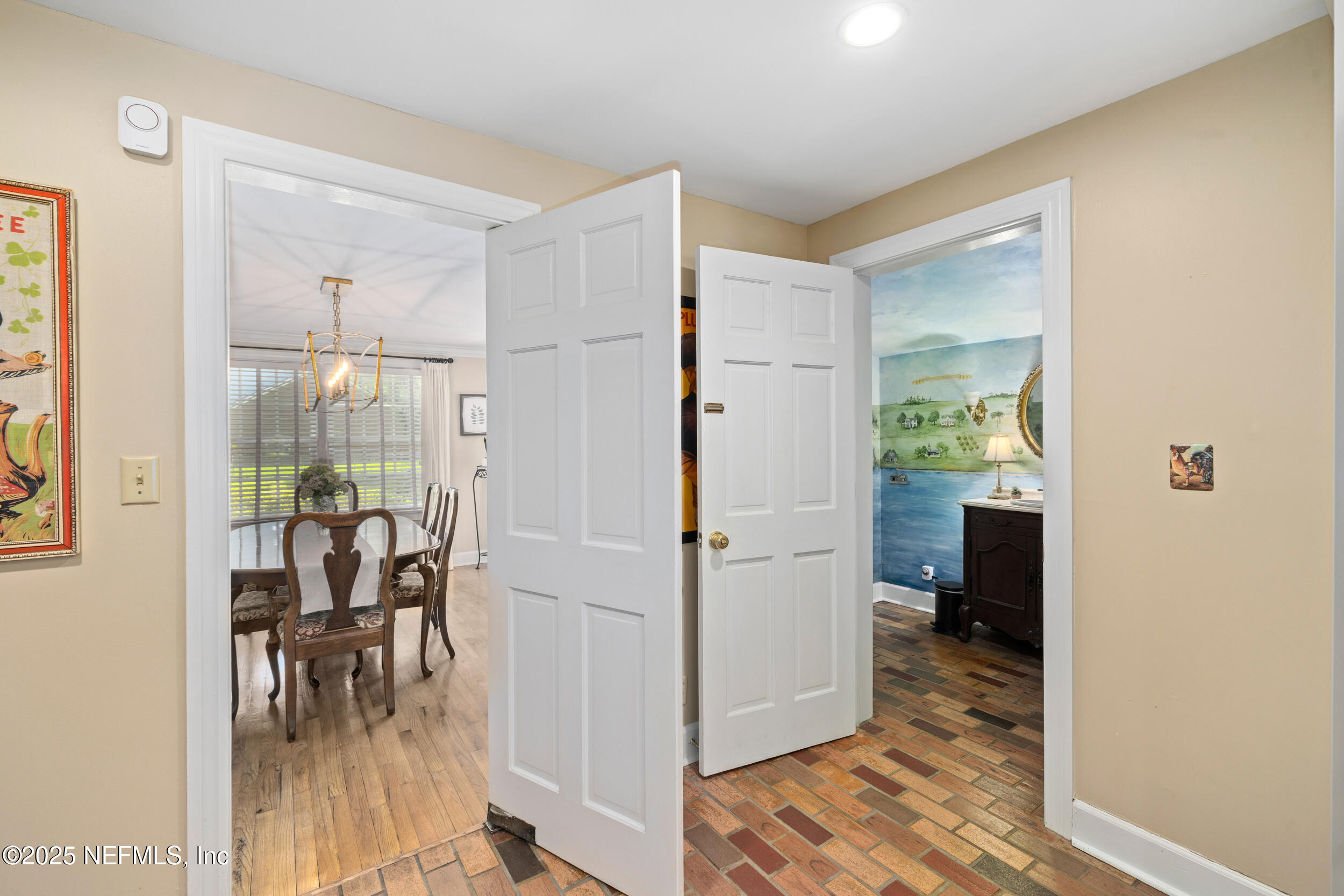 12367 Mandarin Road Jacksonville, FL 32223 - Photo 88 of 114 a view of a dining room with furniture window and wooden floor