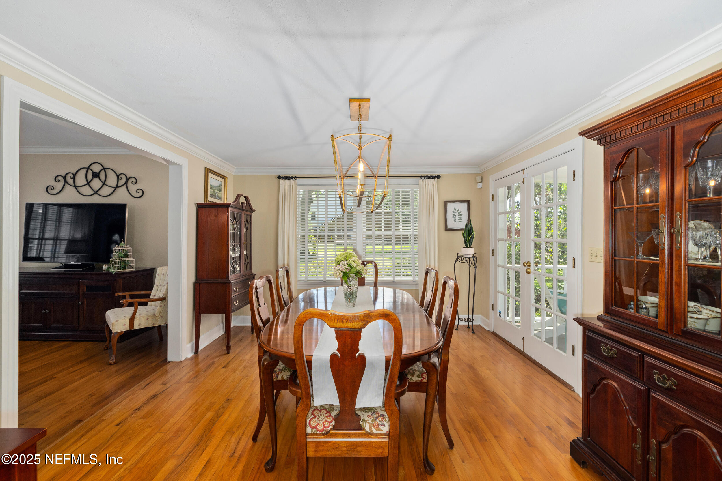 12367 Mandarin Road Jacksonville, FL 32223 - Photo 90 of 114 a view of a dining room with furniture window and wooden floor