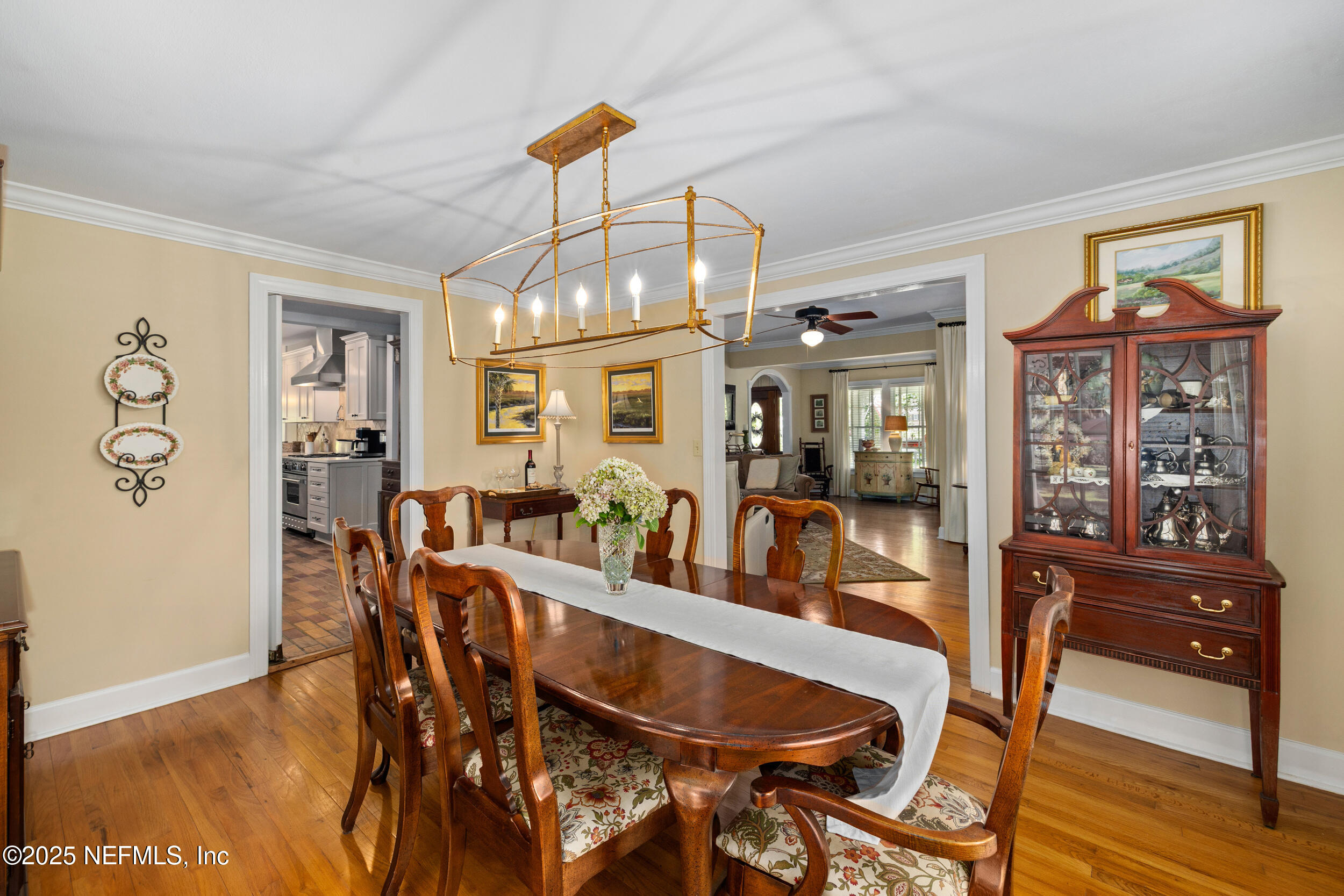 12367 Mandarin Road Jacksonville, FL 32223 - Photo 91 of 114 a view of a dining room with furniture window and wooden floor