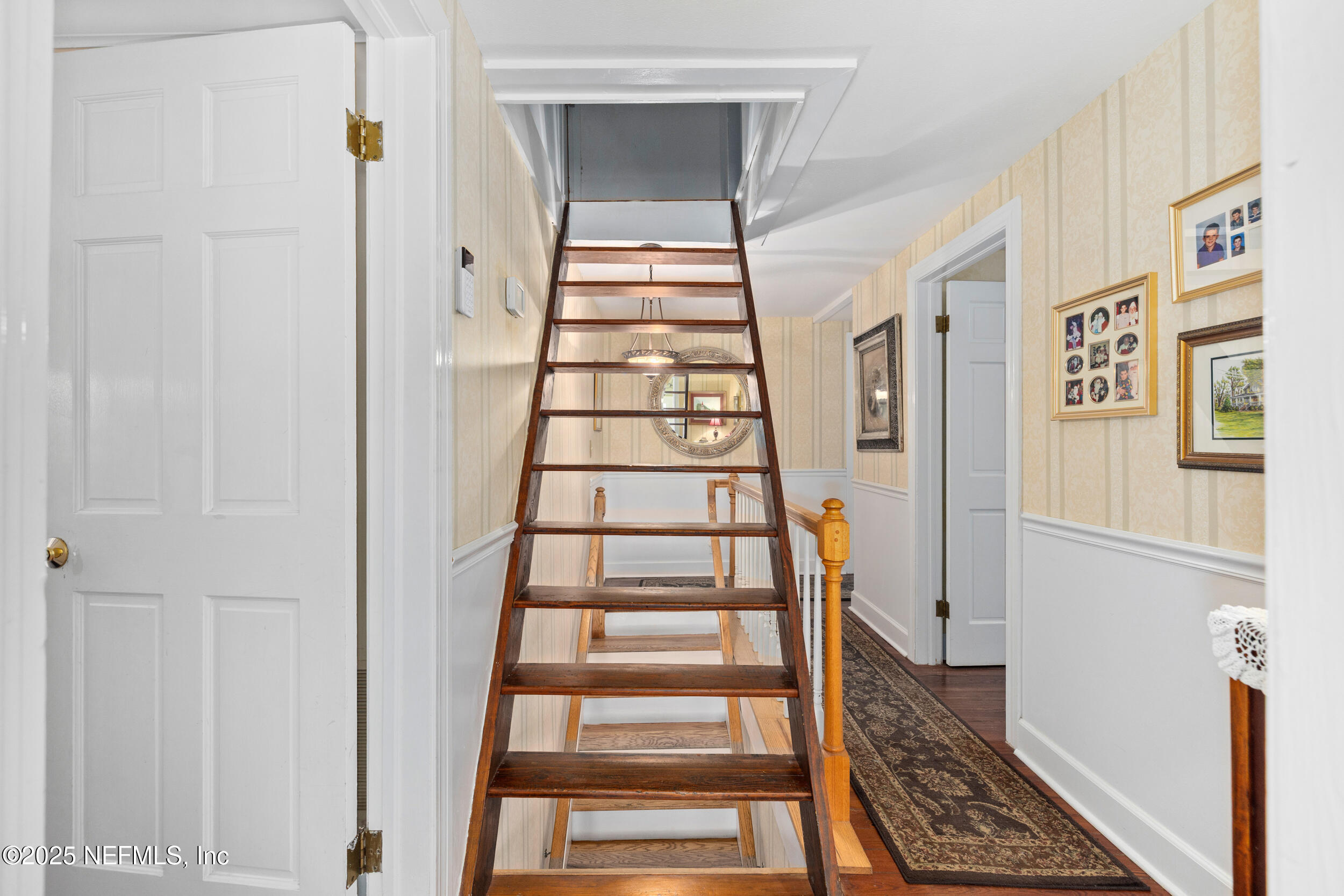 12367 Mandarin Road Jacksonville, FL 32223 - Photo 94 of 114 a view of entryway with stairs and wooden floor