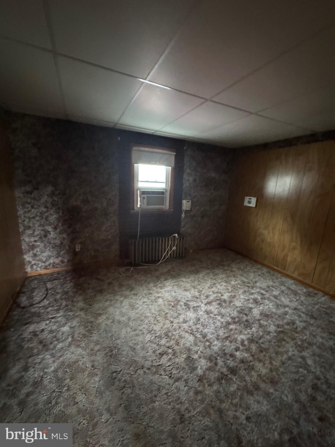 3021 Edgewood Avenue Baltimore, MD 21234 - Photo 6 of 10 an empty room with windows