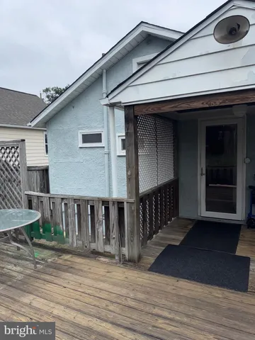 a view of backyard with green space