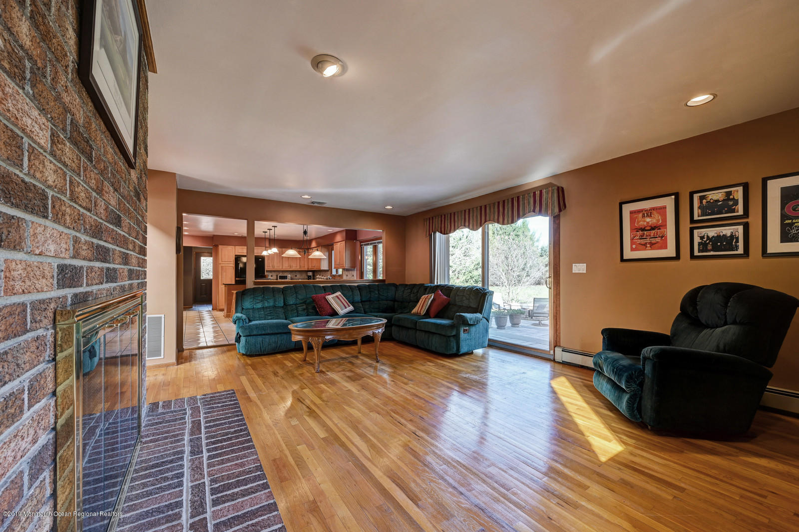 32 Hluchy Road Robbinsville, NJ 08691 - Photo 16 of 33 a living room with furniture and a fireplace