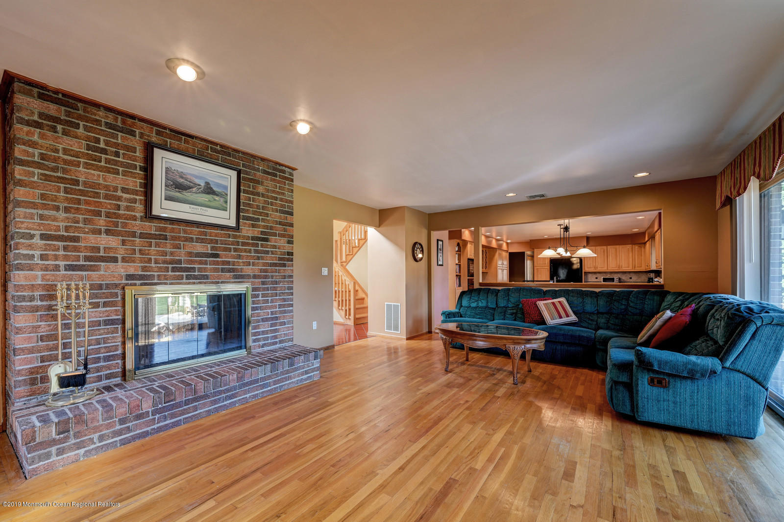 32 Hluchy Road Robbinsville, NJ 08691 - Photo 17 of 33 a living room with furniture and a fireplace