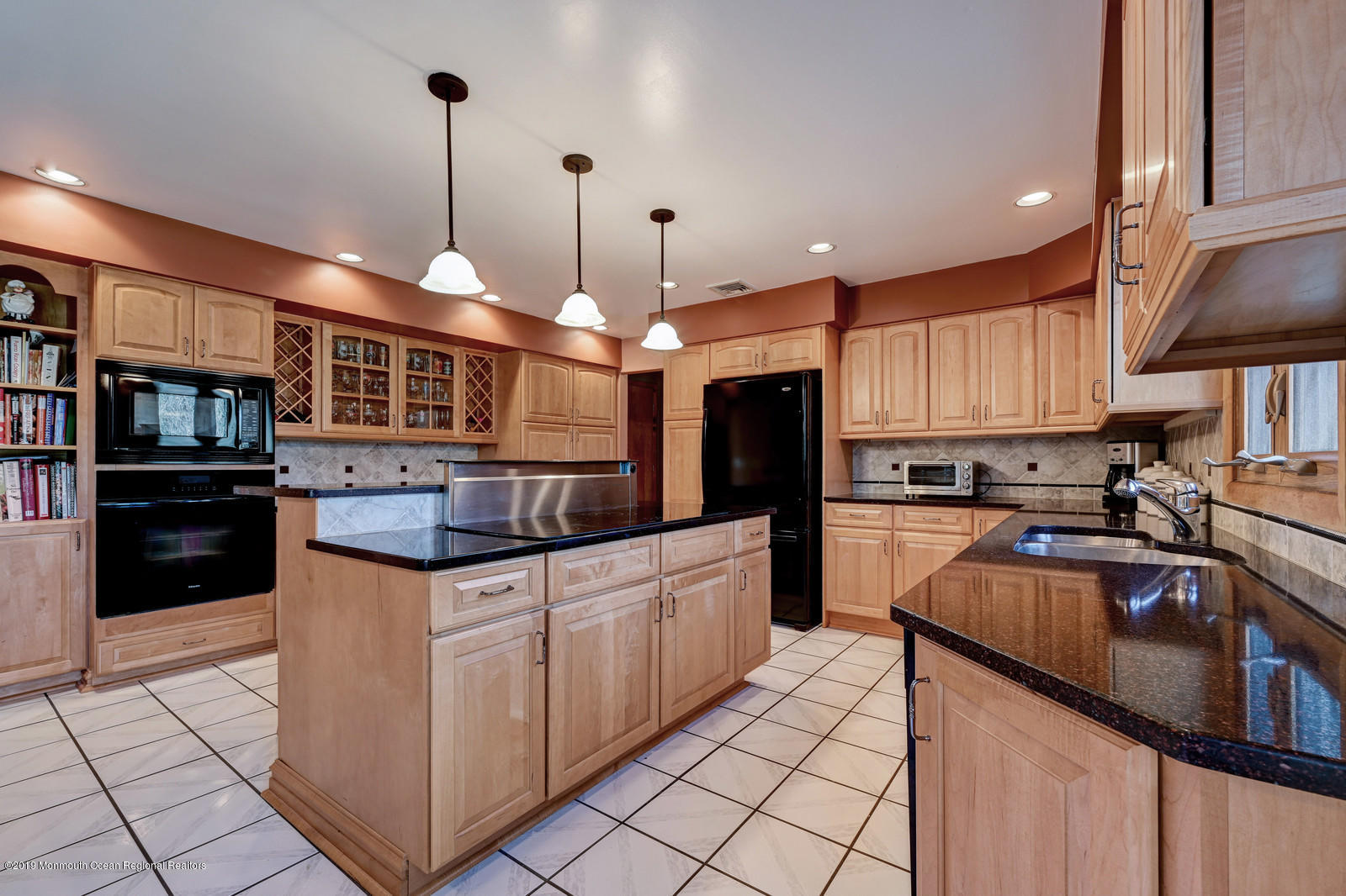 32 Hluchy Road Robbinsville, NJ 08691 - Photo 20 of 33 a kitchen with granite countertop a sink and counter space