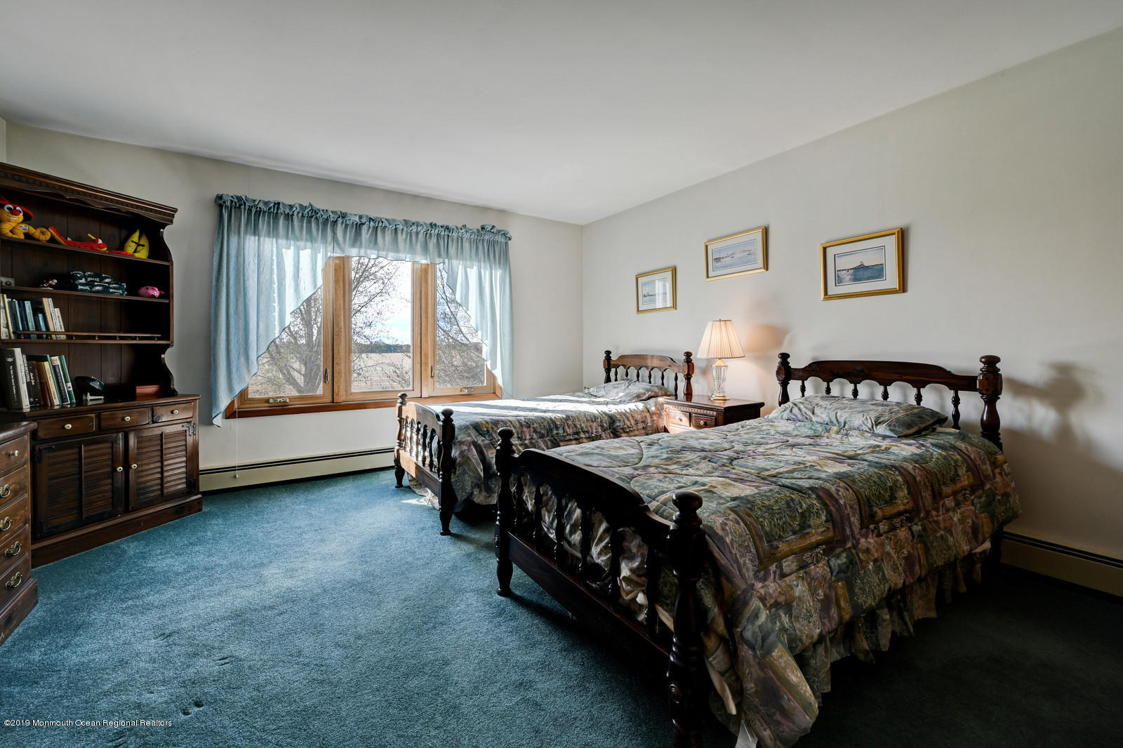 32 Hluchy Road Robbinsville, NJ 08691 - Photo 28 of 33 a spacious bedroom with a bed a couch and large window
