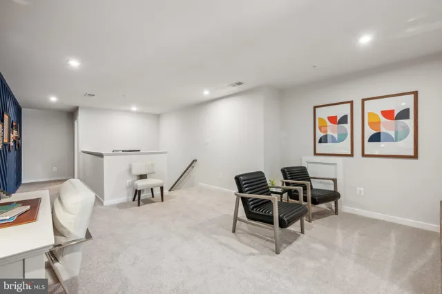 a view of a workspace with furniture