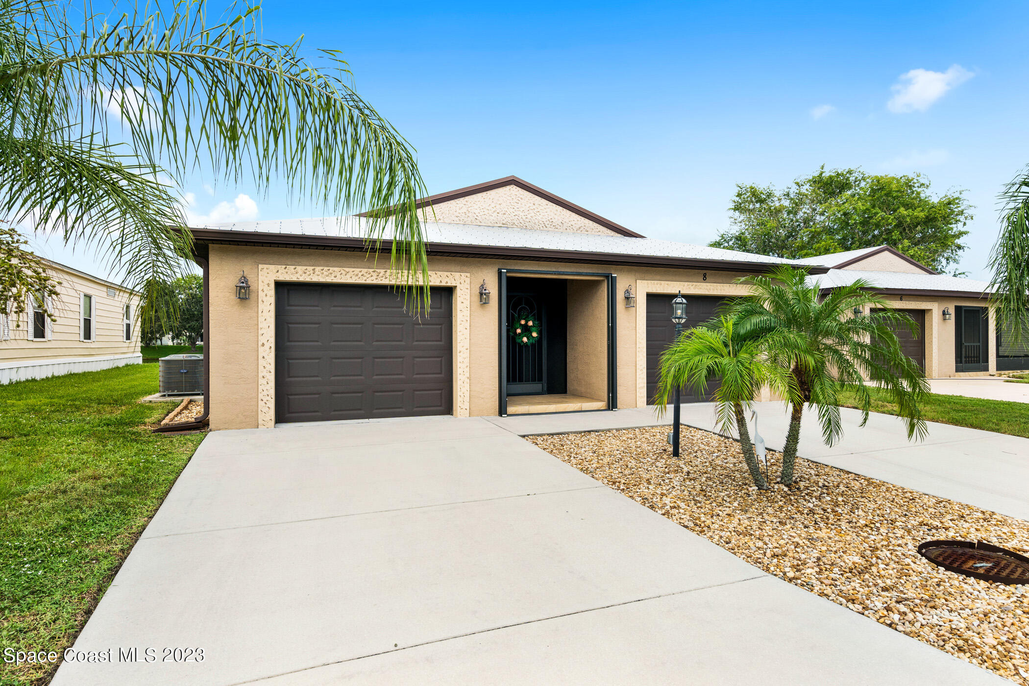 a house view with a garden space
