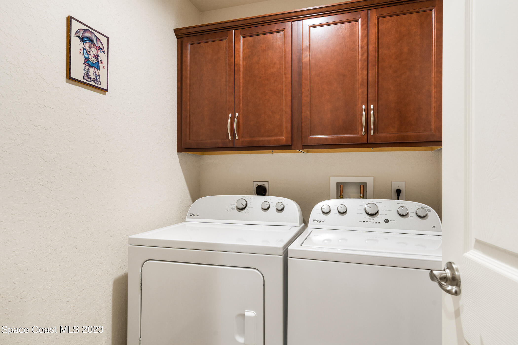 8 Danzar Fort Pierce, FL 34951 - Photo 19 of 31 a utility room with dryer and washer