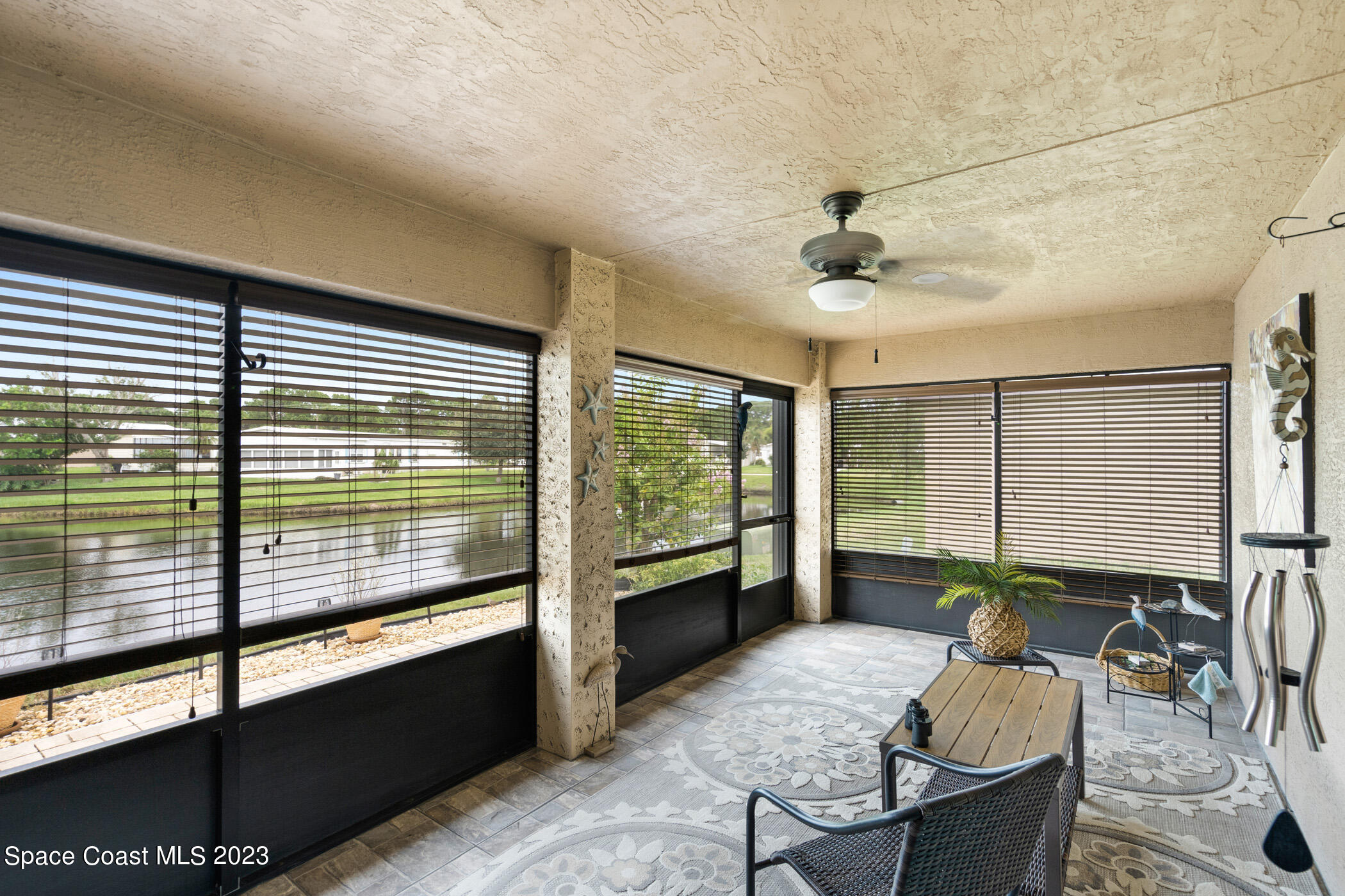 8 Danzar Fort Pierce, FL 34951 - Photo 21 of 31 a living room with furniture and a window