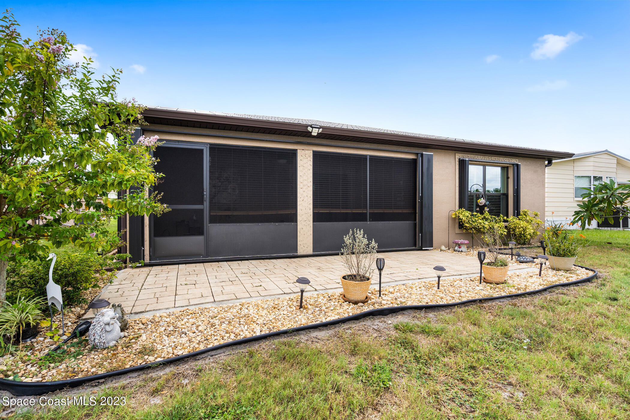8 Danzar Fort Pierce, FL 34951 - Photo 23 of 31 a view of swimming pool with outdoor seating