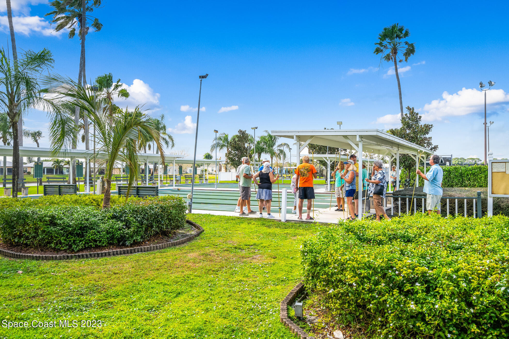 8 Danzar Fort Pierce, FL 34951 - Photo 29 of 31 a view of an chairs and tables in the patio