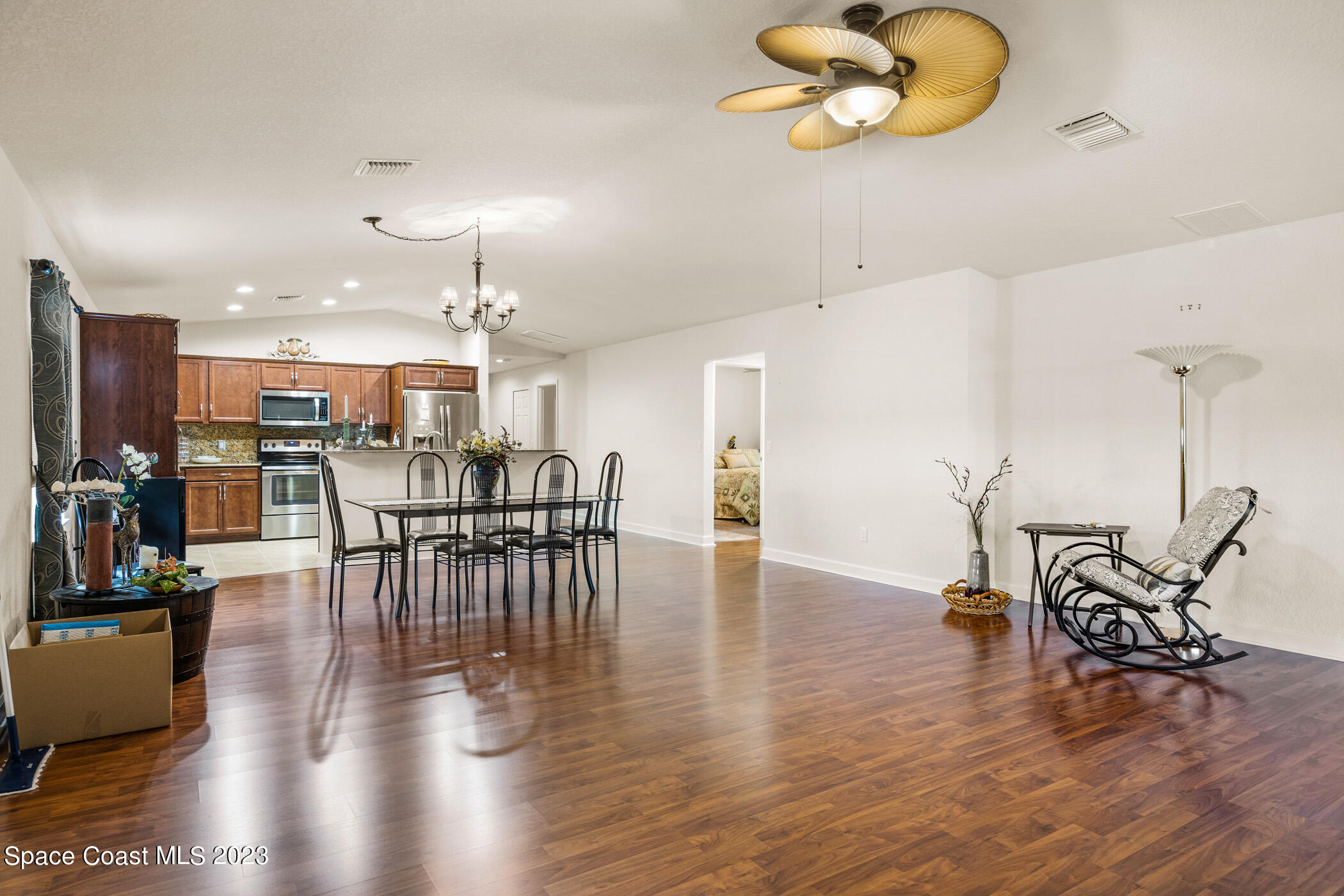 8 Danzar Fort Pierce, FL 34951 - Photo 6 of 31 a view of a dining room with furniture and wooden floor