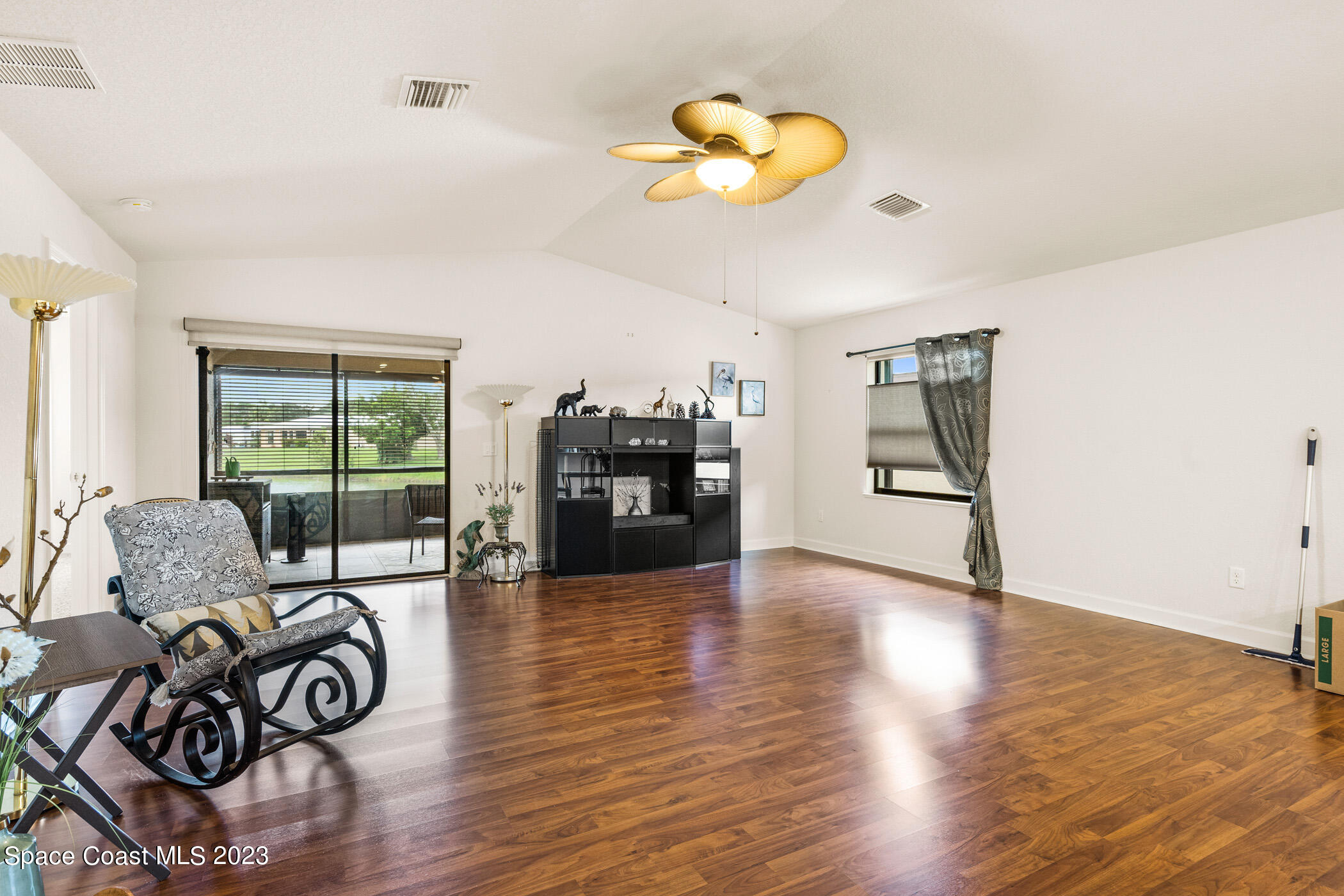 8 Danzar Fort Pierce, FL 34951 - Photo 8 of 31 a view of a livingroom with furniture wooden floor and windows