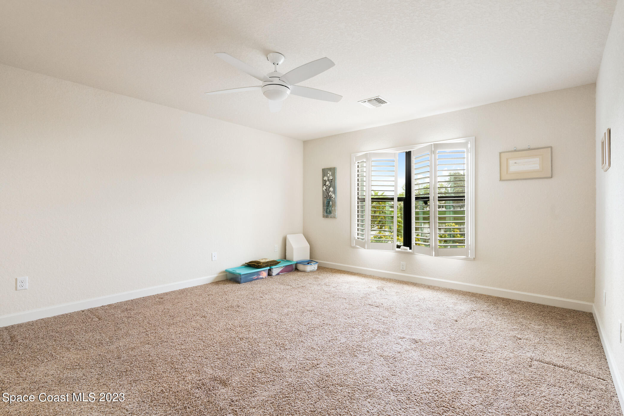 8 Danzar Fort Pierce, FL 34951 - Photo 9 of 31 a view of an empty room with a window