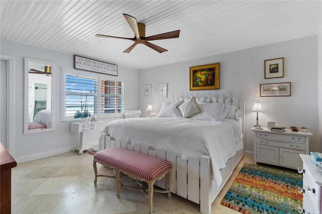 2871 North Ocean Boulevard, Unit D518 Boca Raton, FL 33431 - Photo 14 of 28 a bedroom with a bed and a window