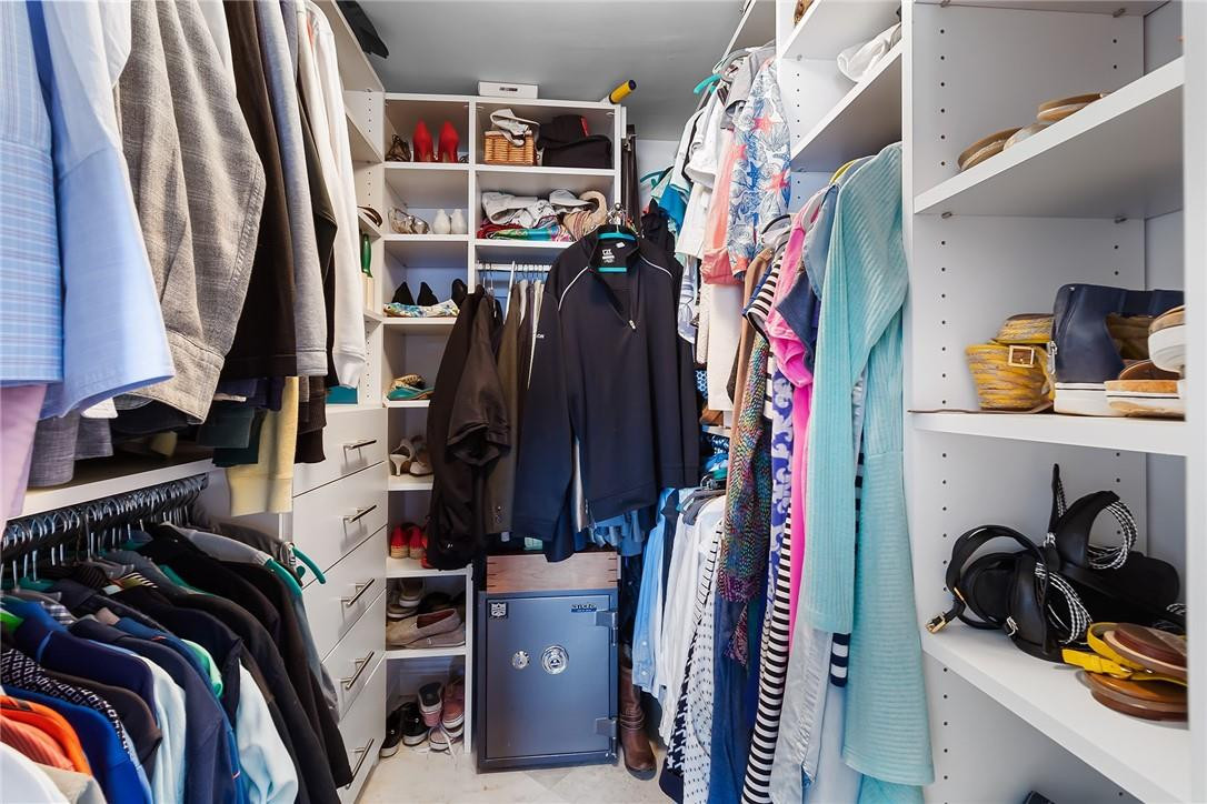 2871 North Ocean Boulevard, Unit D518 Boca Raton, FL 33431 - Photo 17 of 28 a view of walk in closet with clothes and shoes