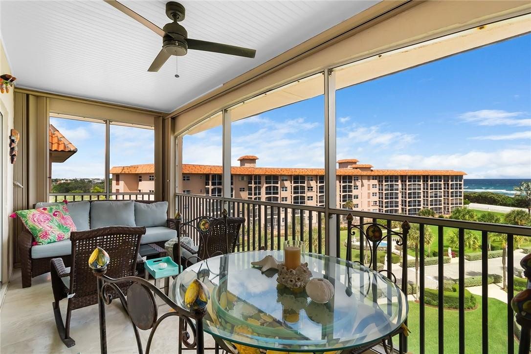 2871 North Ocean Boulevard, Unit D518 Boca Raton, FL 33431 - Photo 19 of 28 a dining room with furniture window and outside view