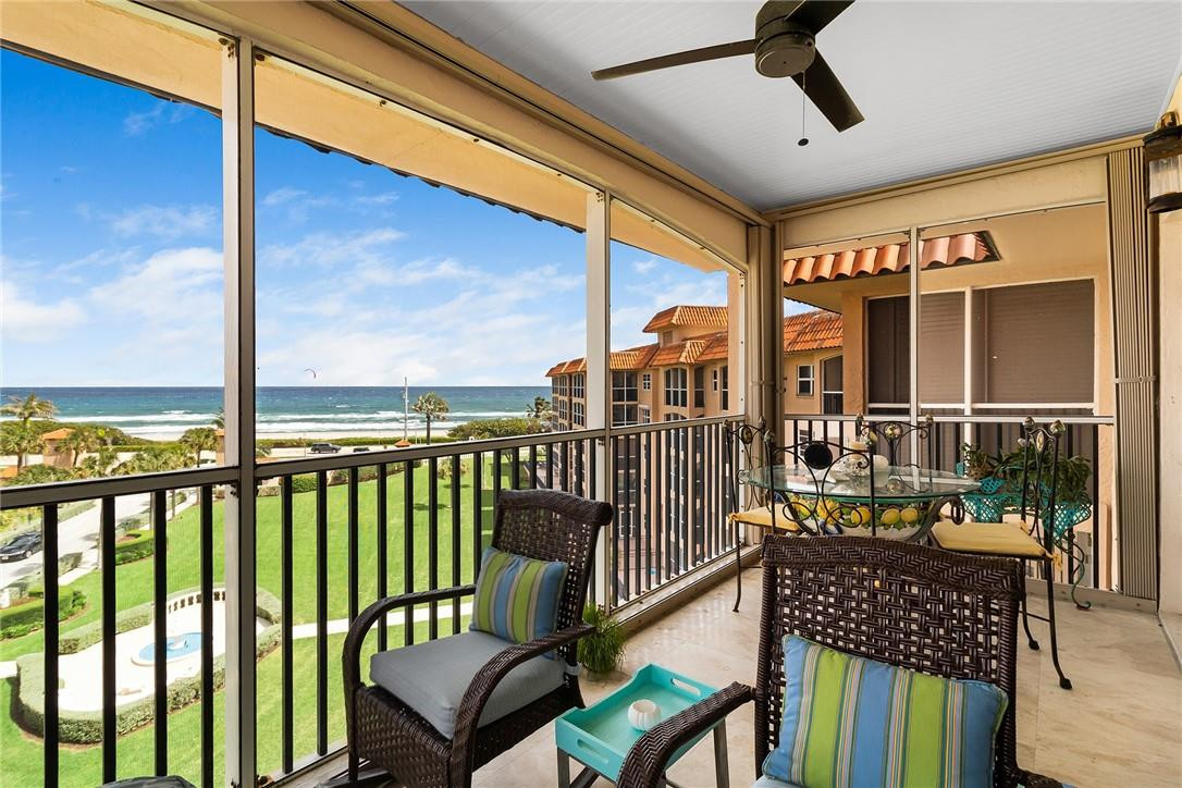 2871 North Ocean Boulevard, Unit D518 Boca Raton, FL 33431 - Photo 20 of 28 a view of a chairs and deck in the balcony