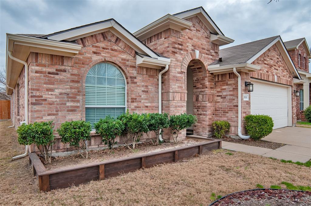 1111 Mount Olive Lane Forney, TX 75126 - Photo 1 of 1 a front view of a house with garden