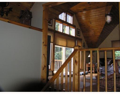 833 Lapham Farm Road Burrillville, RI 02839 - Photo 5 of 11 Den/Family/Great Room. Newer breezeway is tiled, opens to the kitchen, rear deck and family room. Family room s atrium door opens to a separate deck.