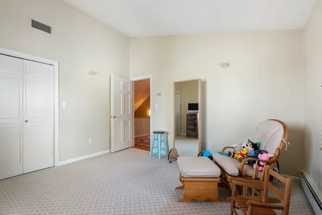 a living room with furniture and a couch
