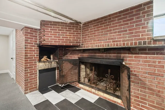a fireplace with a door