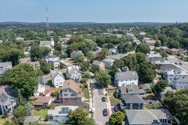 an aerial view of a city with lots of residential buildings