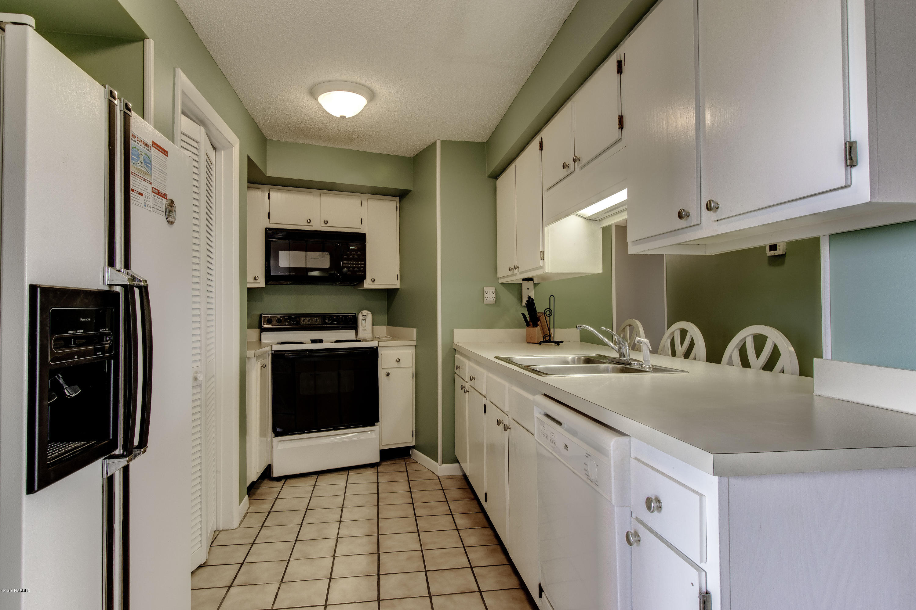 1505 Salter Path Road, Unit 239 Indian Beach, NC 28512 - Photo 3 of 16 Kitchen - entire condo freshly painted in Spring of 2016