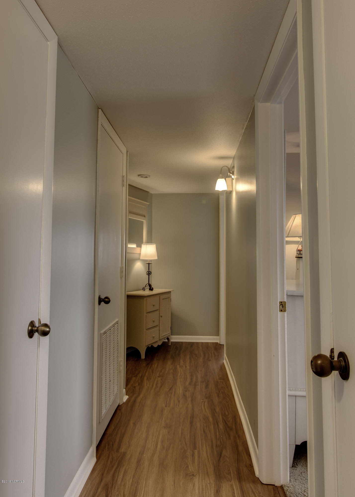 1505 Salter Path Road, Unit 239 Indian Beach, NC 28512 - Photo 8 of 16 Hallway to bedrooms. 1/2 bath is located here.