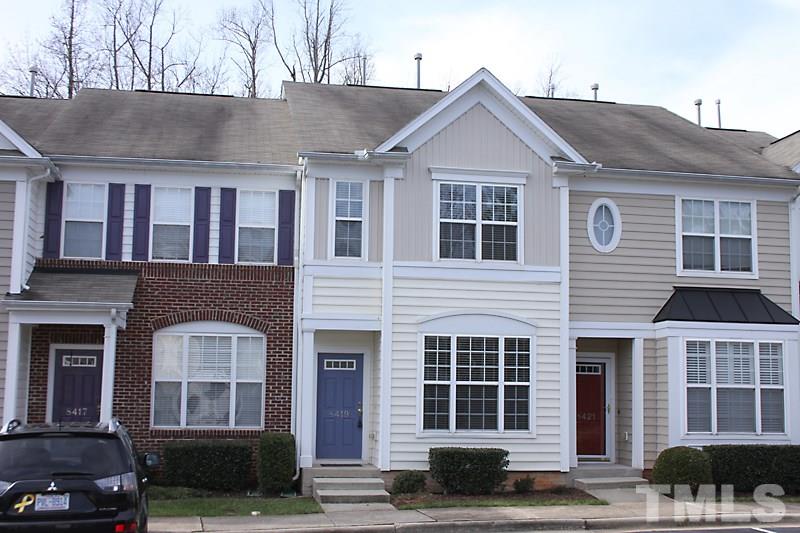 8419 Reedy Ridge Lane Raleigh, NC 27613 - Photo 1 of 20 a front view of residential houses with street