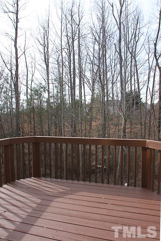 8419 Reedy Ridge Lane Raleigh, NC 27613 - Photo 17 of 20 a view of balcony with wooden floor