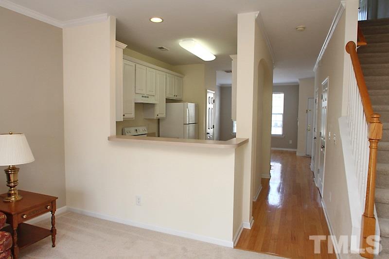 8419 Reedy Ridge Lane Raleigh, NC 27613 - Photo 5 of 20 a view of a kitchen from the hallway