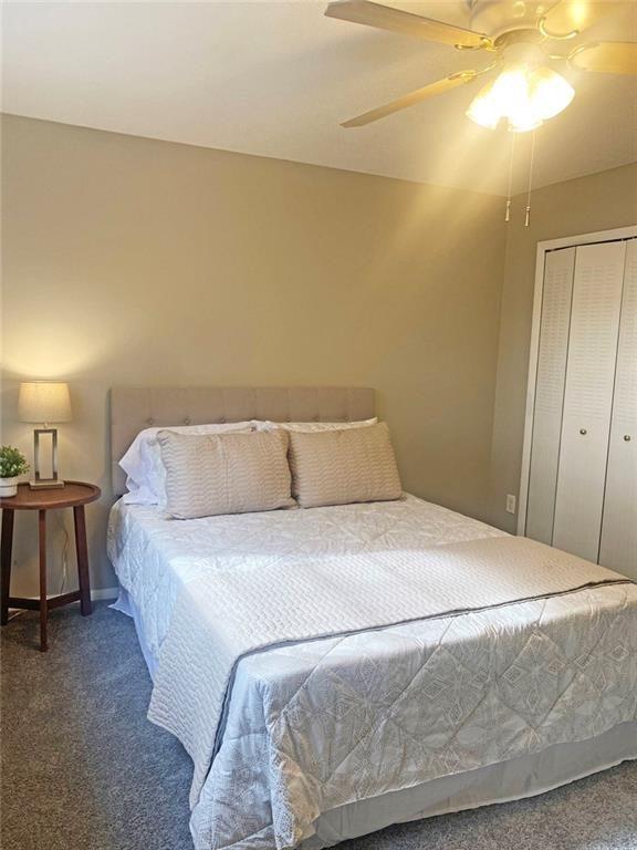 4701 Flat Shoals Road, Unit 5D Union City, GA 30291 - Photo 13 of 20 a bedroom with a bed and lamp