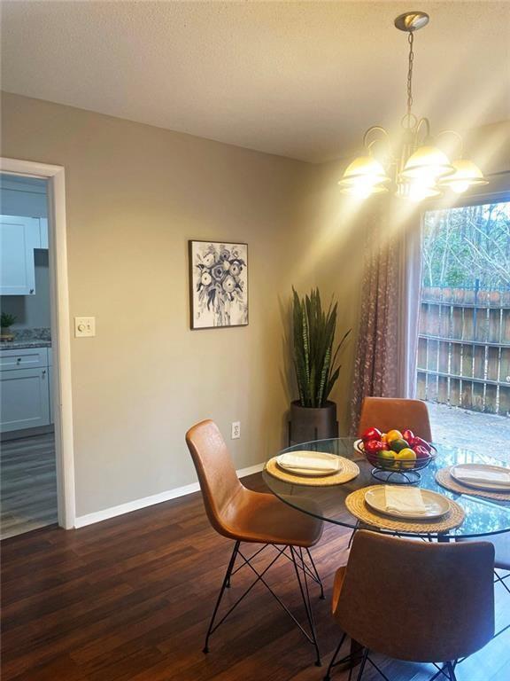 4701 Flat Shoals Road, Unit 5D Union City, GA 30291 - Photo 5 of 20 a table and chairs in a room