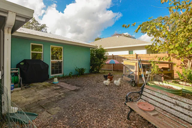 a view of backyard with cabin