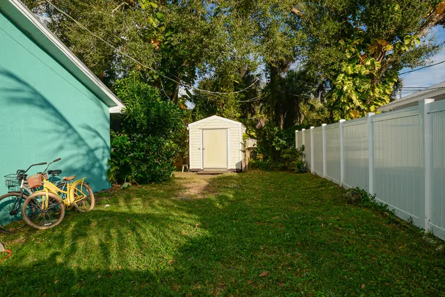 a backyard of a house with lots of green space